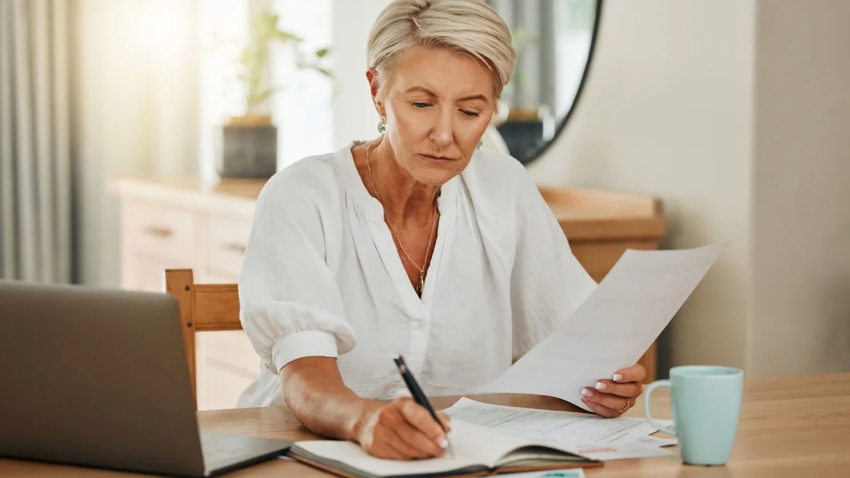 A woman working on her home budget.