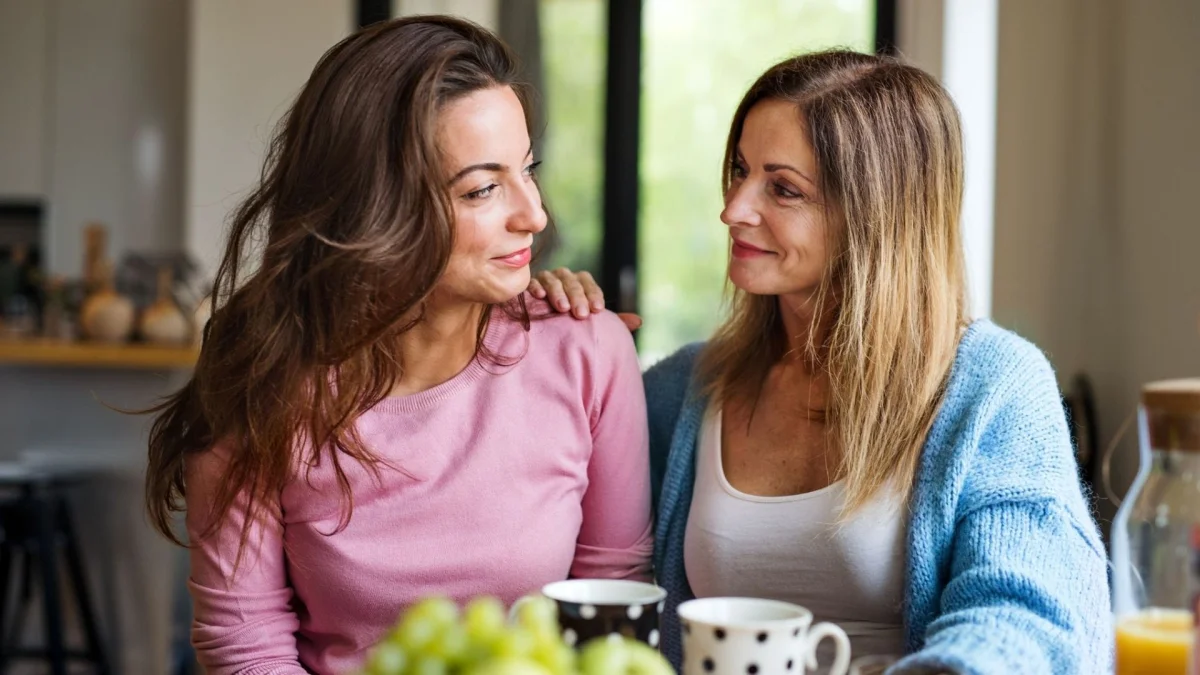 A mother and daughter discussing plans.
